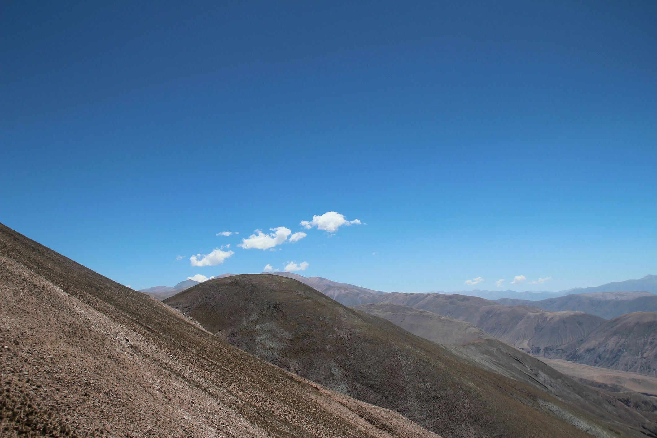 High Andean ridgeline under a blue sky
